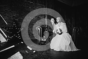 Black white photography beautiful young couple suit on a dark background