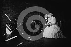 Black white photography beautiful young couple suit on a dark background