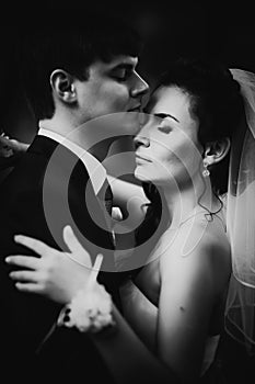 Black white photography wedding beautiful young couple stand on background forest