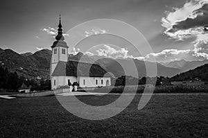 Black and white picture of Church of The Assumption of The Virgin Mary, Bitnje, Slovenia, Europe