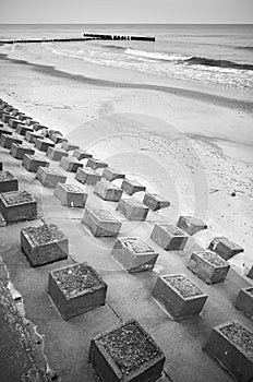 Concrete breakwater on a beach