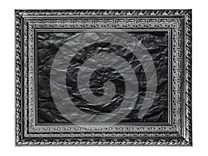 Black and white picture frame with crumpled black paper isolated