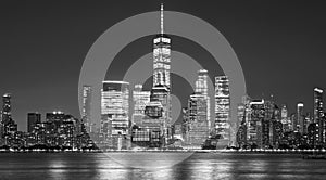 Black and white picture of Manhattan skyline at night, New York City, USA