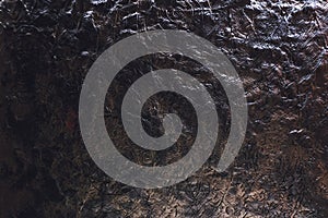 Black and white plasticine texture on a modeling board