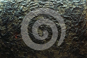 Black and white plasticine texture on a modeling board