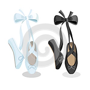 Black and white pointes female ballet shoes on white background. photo