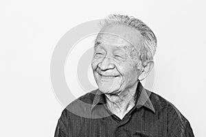 Portrait of Asian elderly senior man. Smiling, Happy old age. Black and white photo.