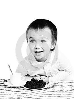 Black-and-white portrait of girl at the table