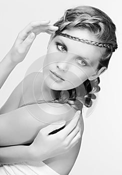 Black and white portrait in high key tone female with creative hairdo braids