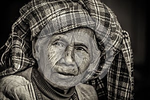 Black and white portrait of an old indigenous woman in Myanmar