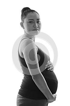 Black and white portrait of pregnant woman