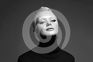 black and white portrait of Short Hair Beautiful young woman with white snow brows