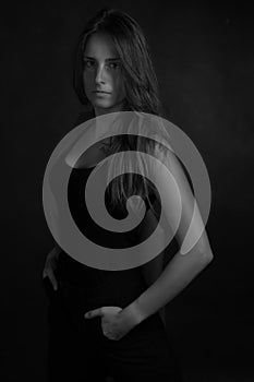 Black and white portrait of a young girl with long hair