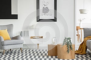 Black and white poster of dog on the wall of fashionable living room interior with two wooden coffee tables with flowers