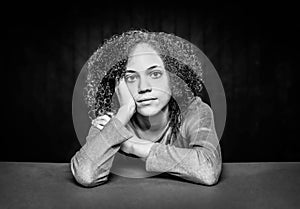 Black and White Pretty Young Girl with Head Resting on Hand