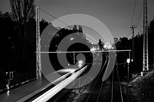Black and white of public train driving through berlin