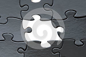 Black and white puzzle pieces