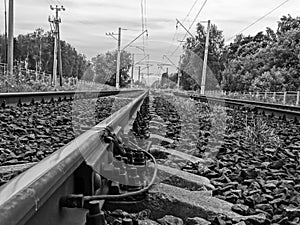 The black and white railway track running to the infinity.