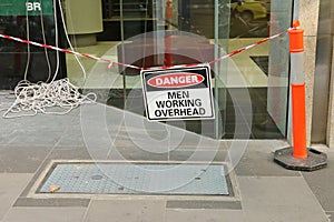 Black, white and red Danger, Men Working Overhead sign
