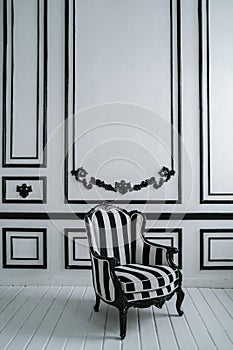 Black and white retro chair in the interior of the room