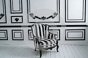 Black and white retro chair in the interior of the room