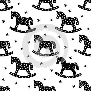 Black and white rocking horses seamless christmas pattern.