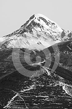 Black and white rocky snowy mountains in Georgia