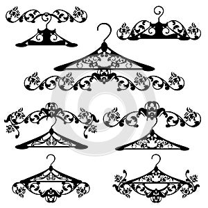 Black and white rose flower and coat hangers vector calligraphic decorative elements