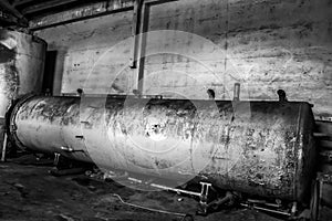Black and White Rusted Tank Machinery in Old Warehouse Cannery
