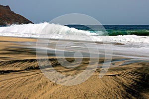 Black and white sand beach