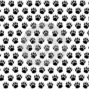 Black and white seamless pattern of dog paw footprints. Silhouette. Puppy footprints. Fur pet paws with claws. Isolated