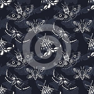 Black and white seamless pattern with white ink moth on dark background