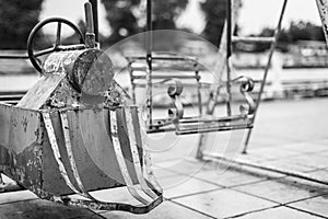 Black and white Selective focus of Old toys in the playground