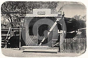 Black and White Sepia Vintage Photo of Old Western Jail in Goldfield Gold Mine Ghost Town in Youngsberg, Arizona