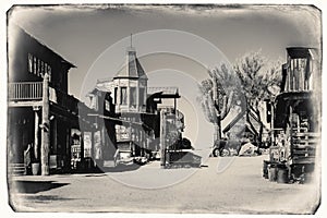 Black and White Sepia Vintage Photo of Old Western Wooden Buildings in Goldfield Gold Mine Ghost Town
