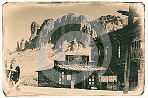 Black and White Sepia Vintage Photo of Old Western Wooden Buildings in Goldfield Gold Mine Ghost Town in Youngsberg