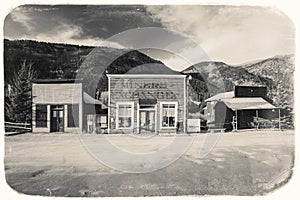 Black and White Sepia Vintage Photo of Old Western Wooden Buildings in St. Elmo Gold Mine Ghost Town in Colorado