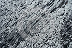 Black and white sharp wave pattern on boulder