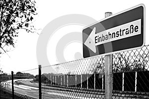 Black and white sign in front of german autobahn