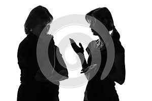 Black and white silhouette of a mother worried that her daughter listens to problems in adolescence