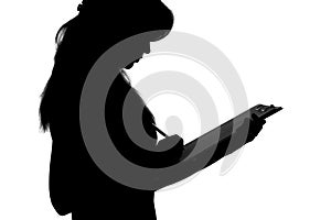 Black and white silhouette of a woman working in an office with a folder for sheets and a pen in the hands