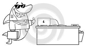 Black And White Smiling Business Shark Cartoon Mascot Character Holding A Thumb Up By An Office Desk.