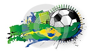 Black and white soccer ball surrounded by green, blue and yellow spots forming the flag of Brazil with a soccer field in the backg