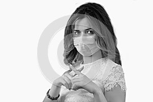 Black and white stop the virus and epidemic diseases. Healthy woman in blue medical protective mask showing gesture stop