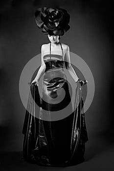 Black and white studio portrait of a young cute girl