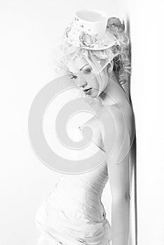 Black and white studio portrait of a young cute girl