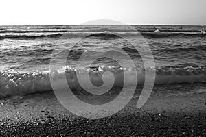 Black and white summer background of hot sand with sea or ocean wave bubbles with copy space
