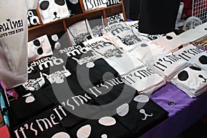 Black and white T-shirts are sold at a street market (Thailand)