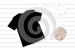 Black and White T-shirts on a White Background