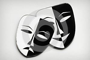 Black and white. Theater masks. White background